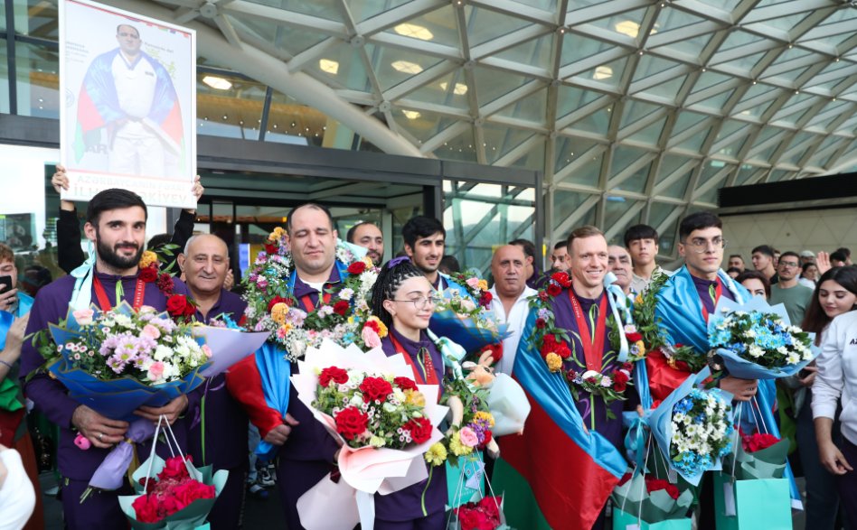 Paralimpiadada medal qazanan idmançılarımız Vətənə döndülər - FOTO/VİDEO - foto 2