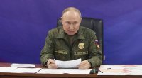 Putin hərbi geyimdə komandanlarla müşavirə keçirdi - VİDEO