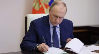 Putin Peskova &ldquo;Rusiya Qəhrəmanı&rdquo; adını VERDİ &ndash; FOTO