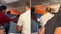 Poverbank alovlandı, təyyarə təcili eniş etdi - Video
