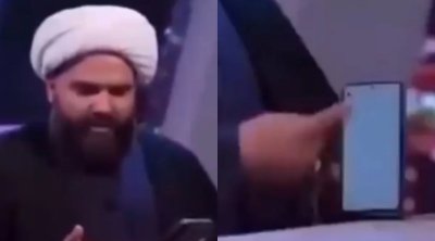 İranda efirdə mesaj oxuyan molla biabır oldu - VİDEO