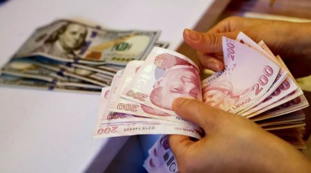 Türkiyədə bir dollar 10 lirəyədək ucuzlaşdı
