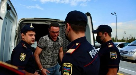 Polisi döyən deputatın məhkəməsi başladı