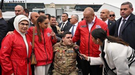 Prezidentin qucaqladığı qazi kimdir? - \