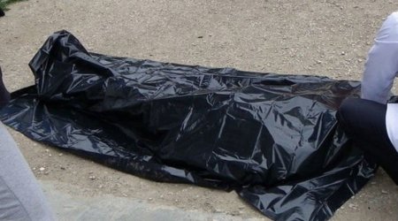 Bakıda məişət tullantıları yanan ərazidən meyit tapıldı