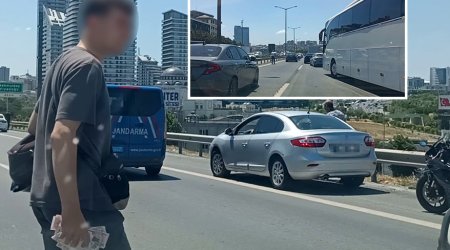 Kuryer motosikletdən yıxıldı, yola səpələnmiş pulları sürücülər yığdı &ndash; VİDEO