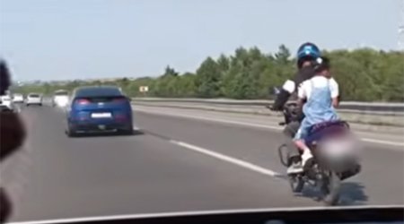 Övladını təhlükəli vəziyyətdə motosikletlə aparan ata saxlanıldı - VİDEO