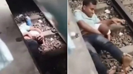 Ata relslərin üzərinə düşən övladını belə xilas etdi &ndash; ANBAAN VİDEO